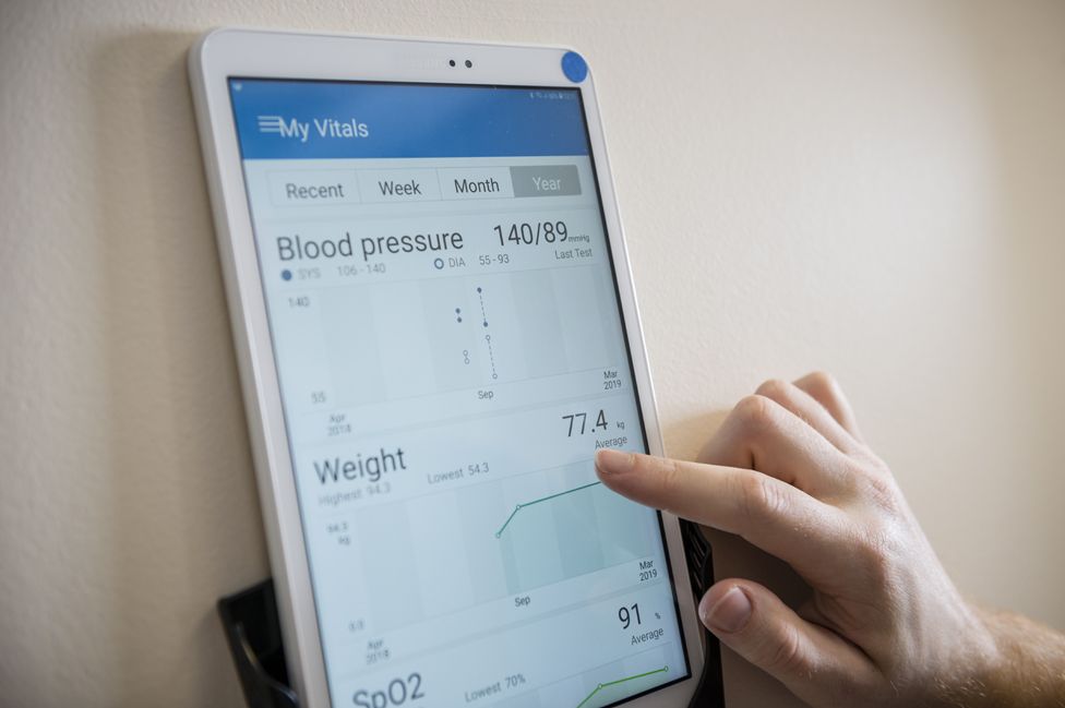 An app which monitors vital signs such as blood pressure