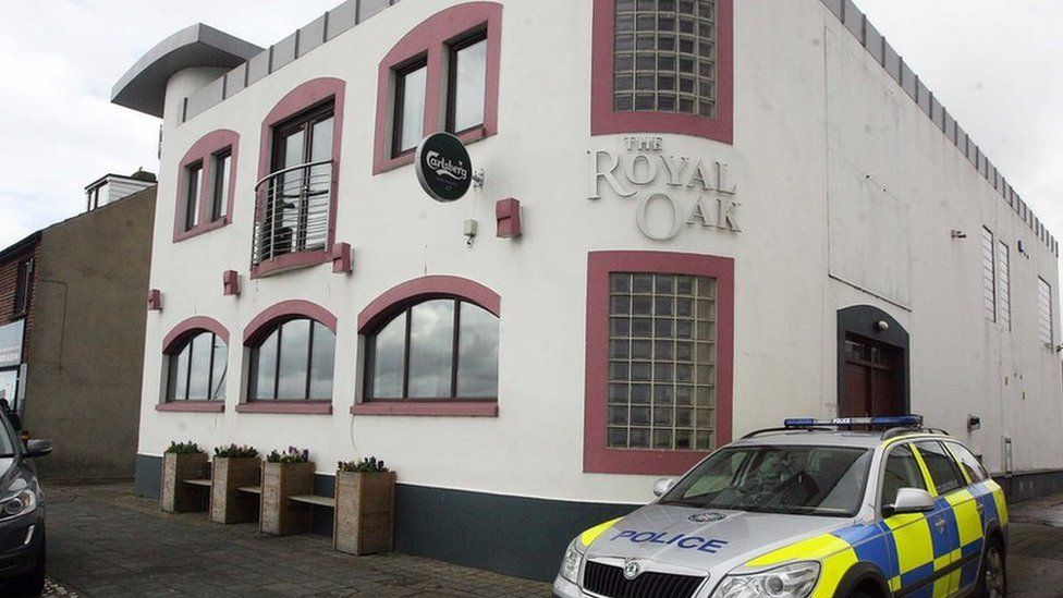 The attack happened at the Royal Oak bar in Carrickfergus