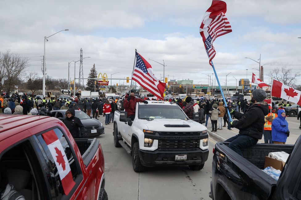 Police face protesters in Windsor