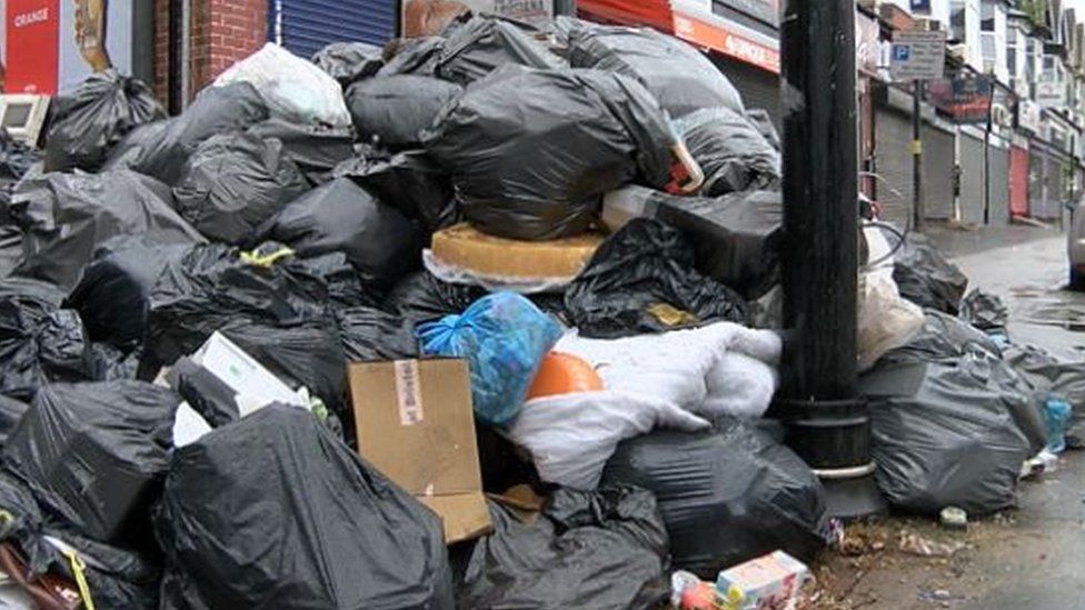 Piles of rubbish bags