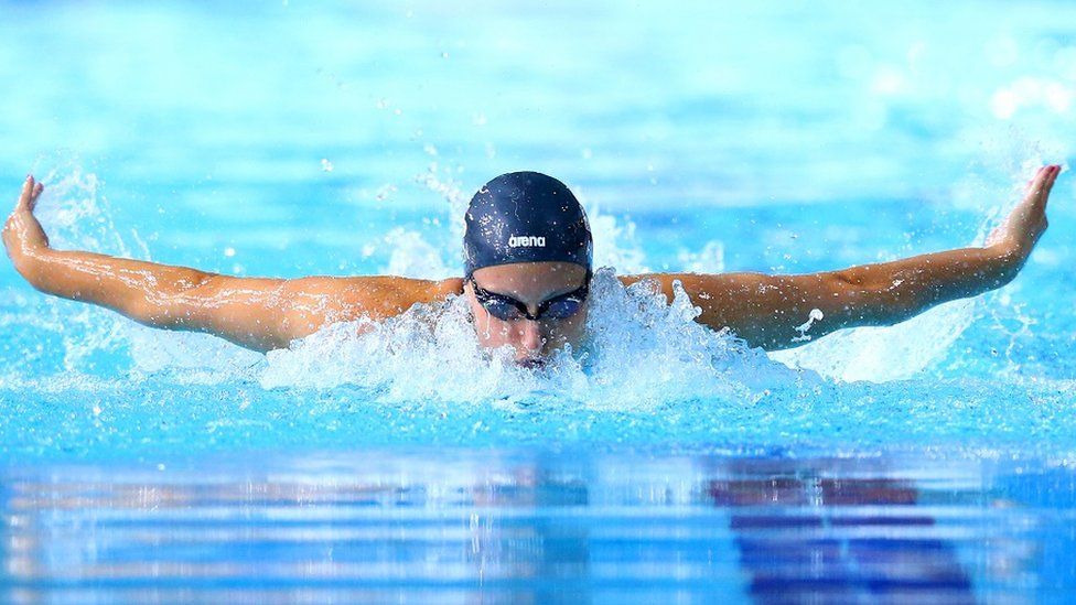Sophie Allan competing in 200m individual medley at Glasgow Commonwealth Games