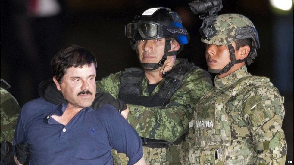 Joaquin "El Chapo" Guzman faces the media in handcuffs following his capture by Mexican soldiers and marines six months after he escaped from jail. (8/01/16)