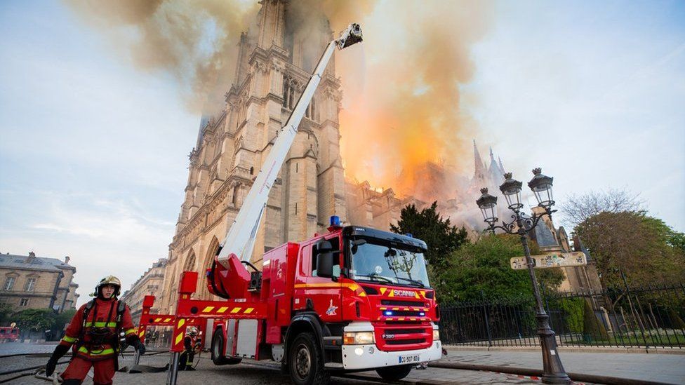 French firefighters at the scene of the fire at Notre Dame cathedral in Paris