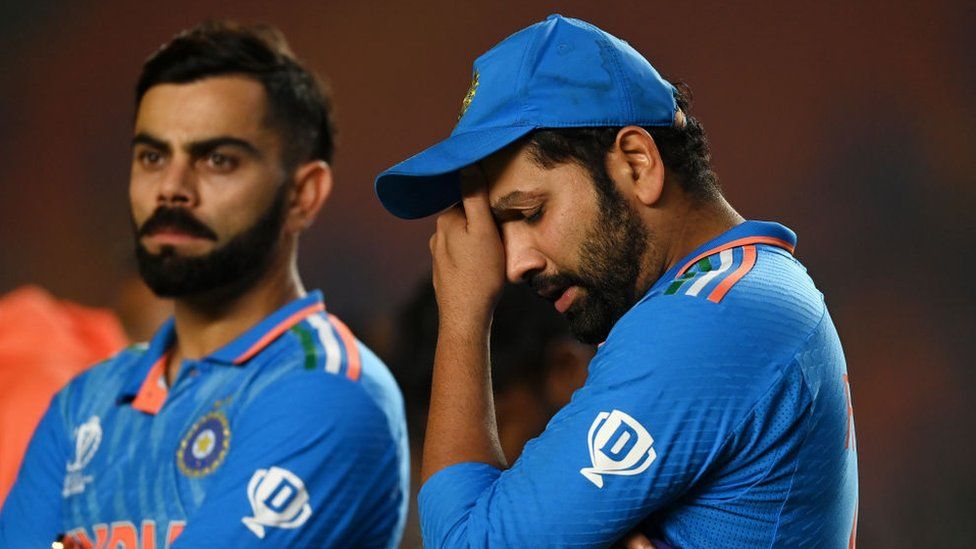 AHMEDABAD, INDIA - NOVEMBER 19: Rohit Sharma of India cuts a dejected figure following the ICC Men's Cricket World Cup India 2023 Final between India and Australia at Narendra Modi Stadium on November 19, 2023 in Ahmedabad, India. (Photo by Gareth Copley/Getty Images)