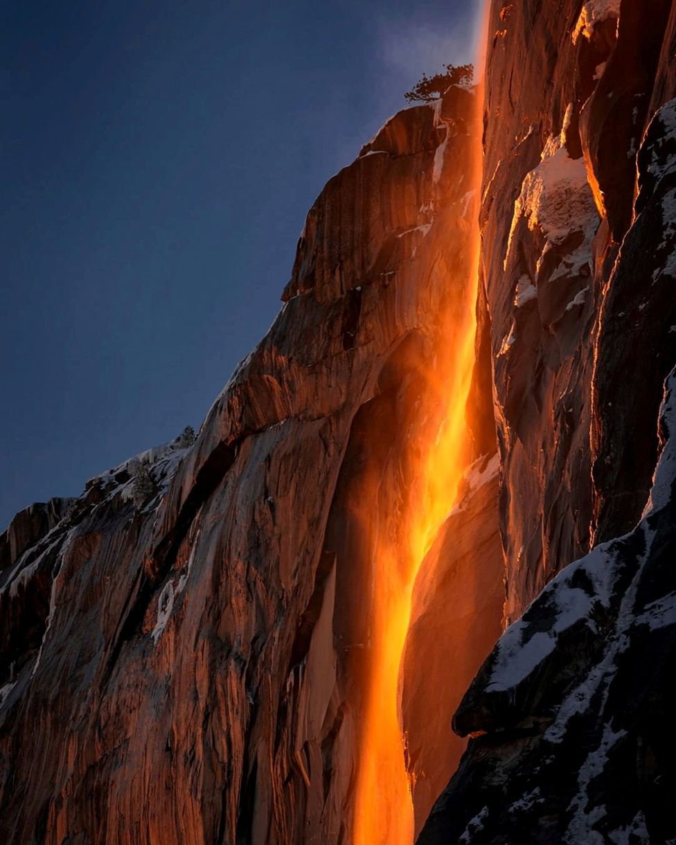 Sunlight hits the Horsetail Fall, turning it into a Firefall at Yosemite National Park, California, U.S., February 18, 2019, in this photo taken from social media.