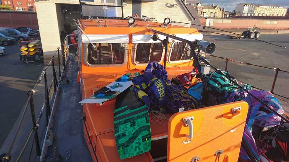 Three kitesurfers rescued from sea by Rhyl lifeboat BBC News