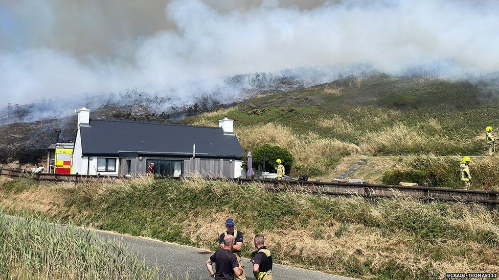 Pembrokeshire fire fighters were dealing with a grass fire above Newgale, in very hot conditions