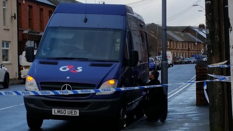 A security van outside TSB Bank in Glynneath