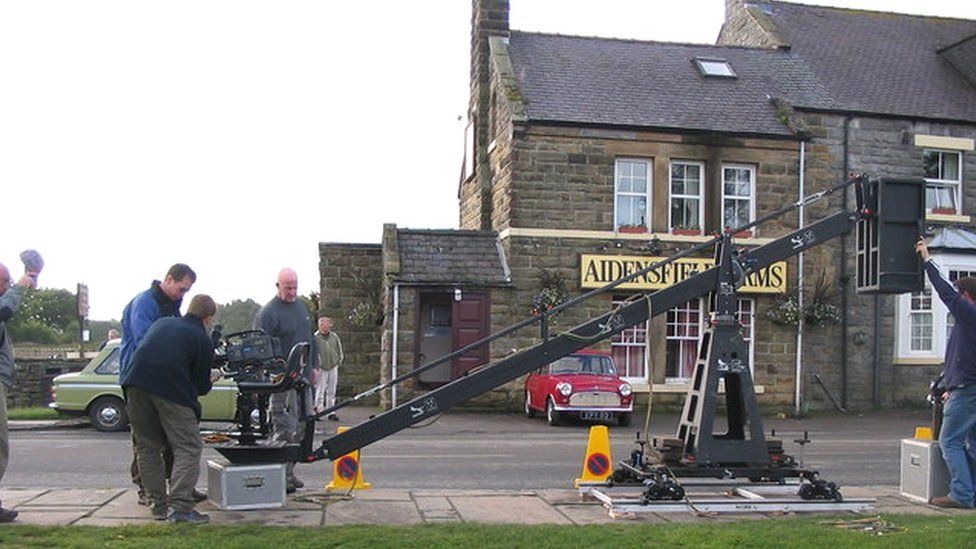 Goathland Hotel with filming crew outside