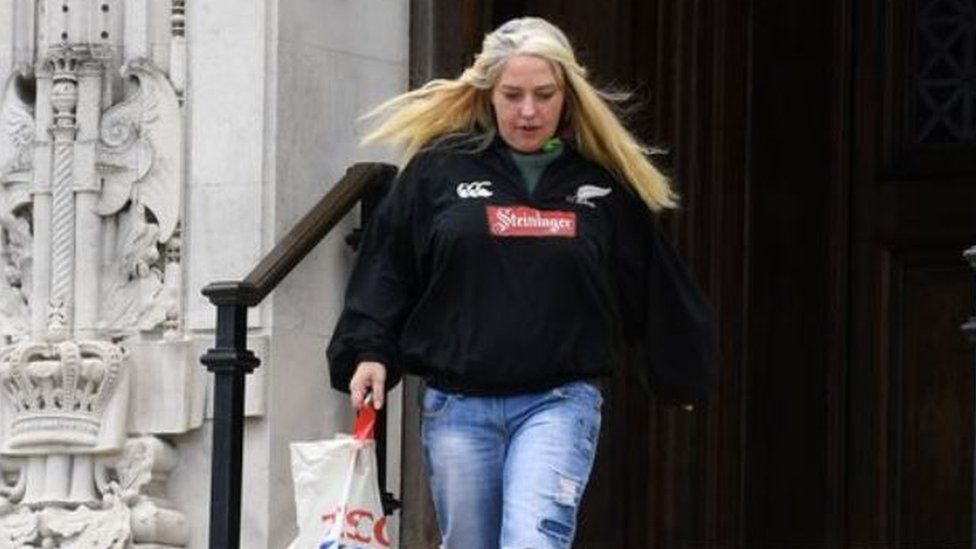 Angharad Roberts leaving Cardiff Crown Court - wearing and All Blacks rugby hoody, ripped jeans and carrying a Tesco bag