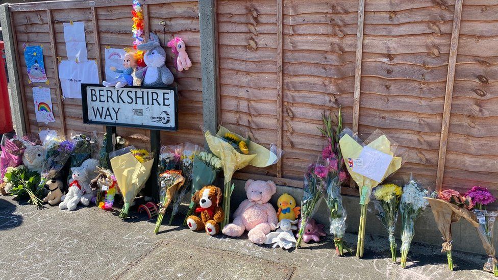 Flowers and Teddies on top of Berkshire Way sign