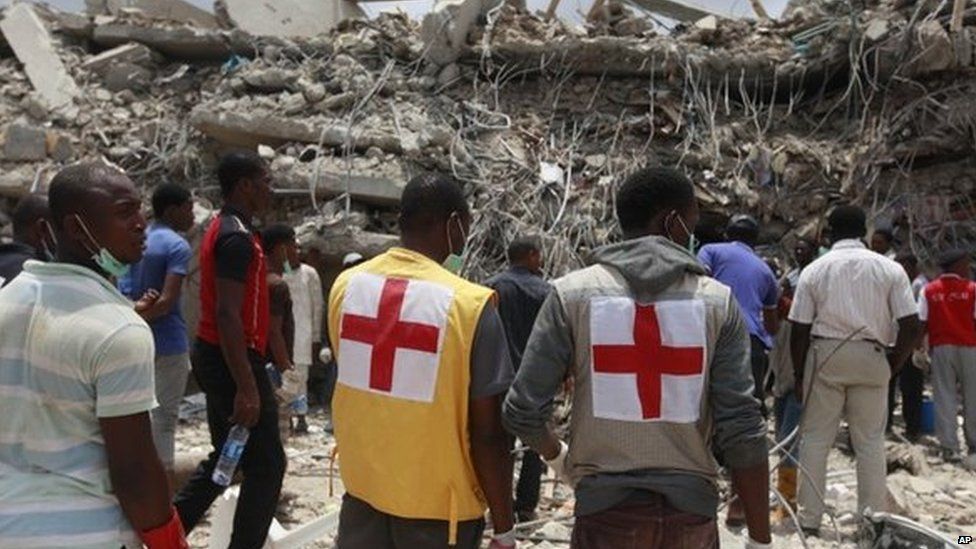 Rescue workers search for survivors in the rubble of a collapsed building belonging to the Synagogue Church of All Nations in Lagos on Saturday, 13 September.