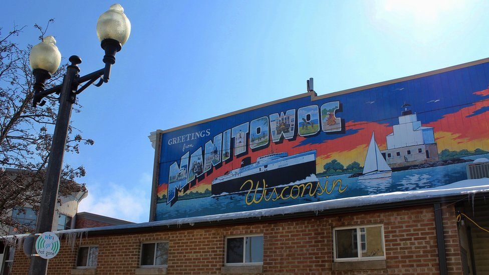 A colourful mural welcomes people to the Manitowoc