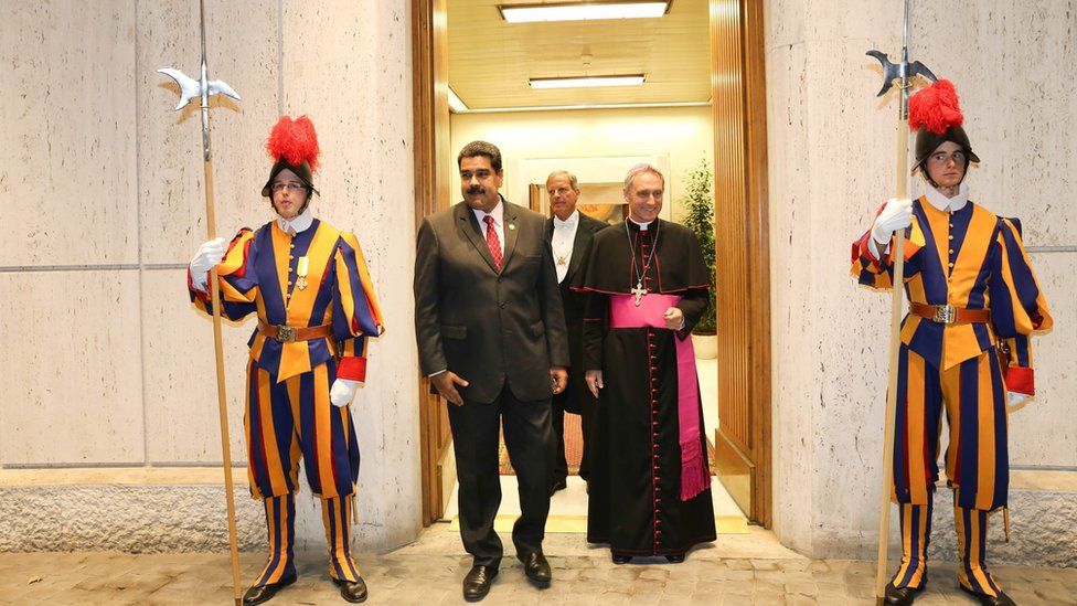 A handout picture provided by Miraflores Press shows Venezuelan President Nicolas Maduro (C-L) being received by Prefect of the Papal Household, German Archbishop Georg Gaenswein (C-R) prior to a private meeting between Maduro and Pope Francis, at the Vatican, 24 October 2016