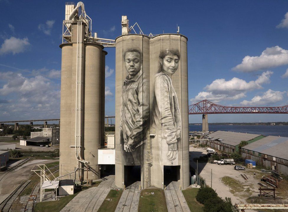 Guido van Helten's mural on the side of two giant grain silos in Jacksonville, Florida.