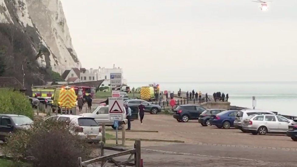 The man was airlifted to hospital after falling halfway down the cliff