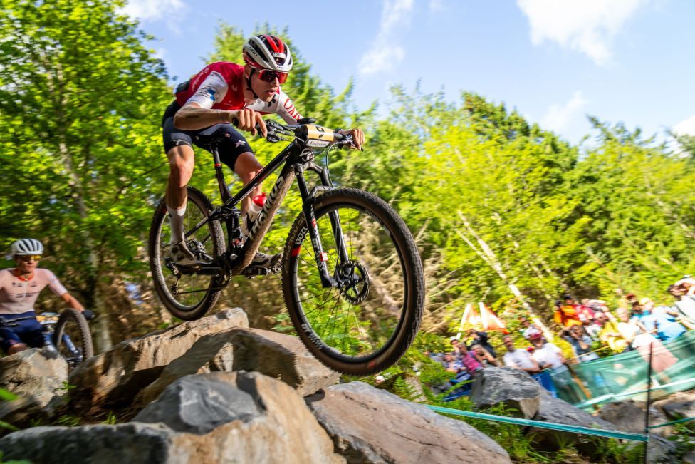 Luke Wiedmann from Switzerland in action during the Men's Under 23 Cross-Country Olympic final at the UCI Cycling World Championships 2023 in Glentress,