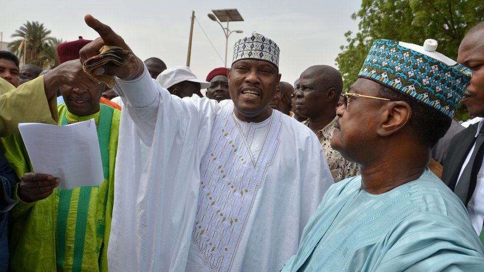 Niger's opposition leader Hama Amadou and former Prime Minister Seini Oumarou at a march in Niamey on 15 June 2014.