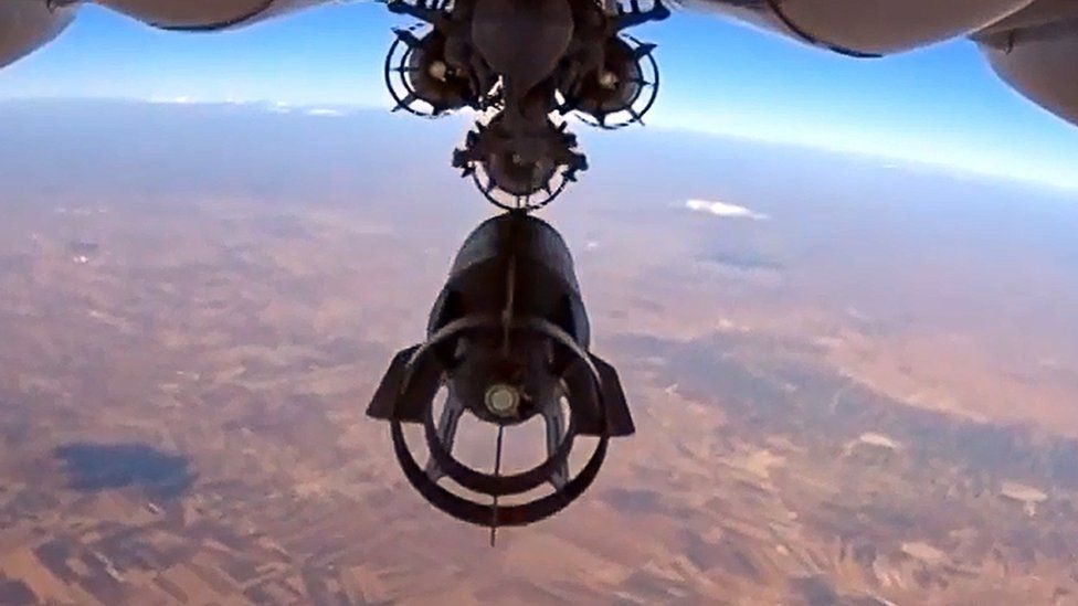 Russian Su-24M bomber dropping bombs during an airstrike in Syria