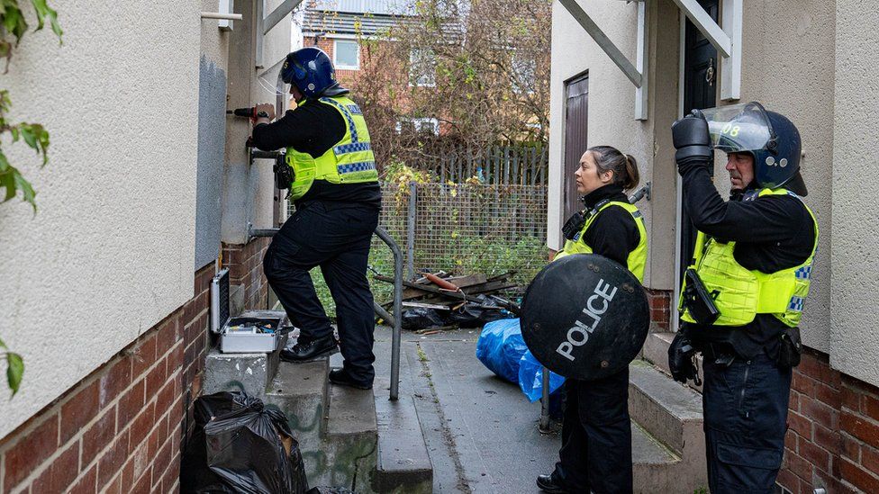 Northumbria police officers raiding a property during Operation Sceptre