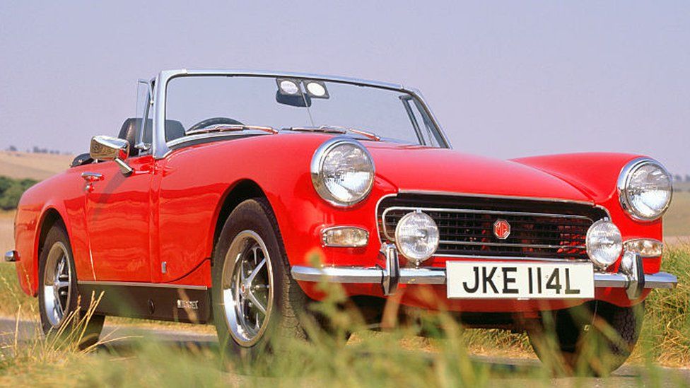 A 1973 MG Midget 1275 in country lane.