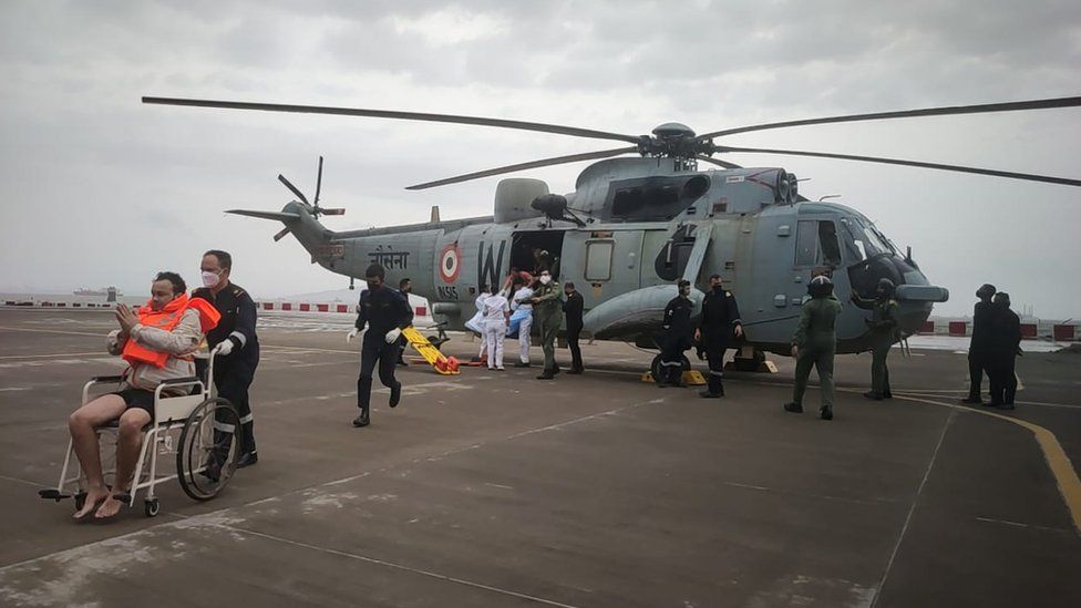 People recued from the sunken barge are being treated on the India's naval ships
