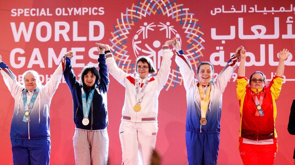 Athletes receiving their medals during declaration ceremony at the Special Olympics World Games in Abu Dhabi