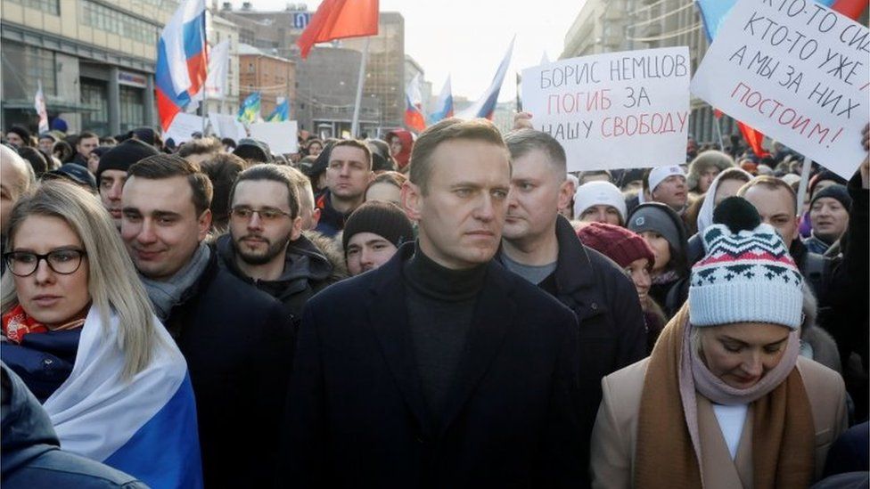 Alexei Navalny, his wife Yulia and opposition figure Lyubov Sobol take part in a rally to mark the 5th anniversary of opposition politician Boris Nemtsov"s murder and to protest against proposed amendments to the constitution, in Moscow, Russia February 29, 2020