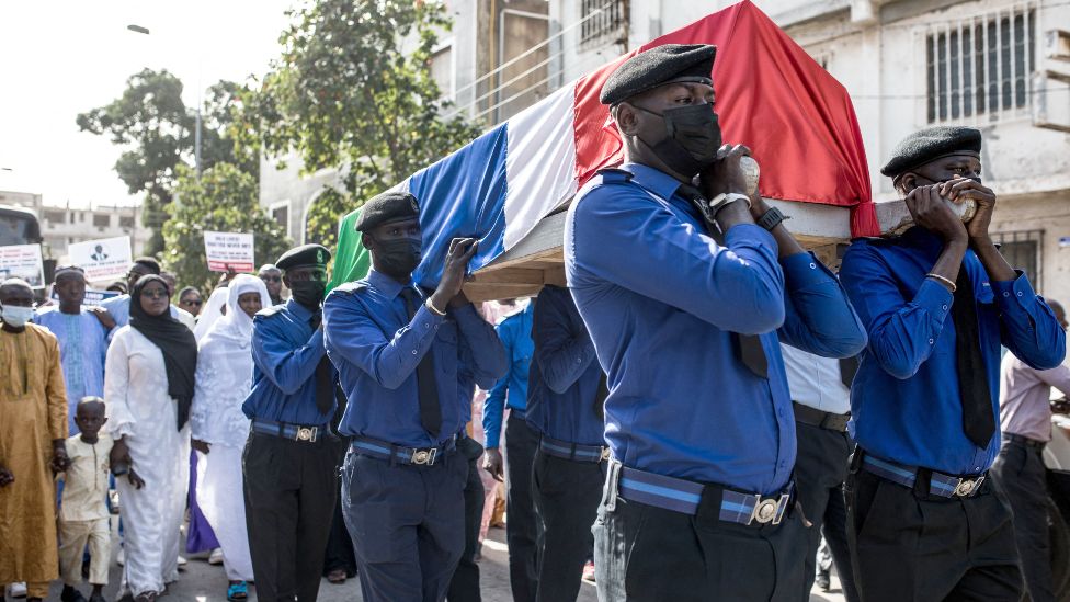 Pallbearers carry the coffin of Solo Sandeng during his funeral in Banjul, The Gambia - 10 January 2023