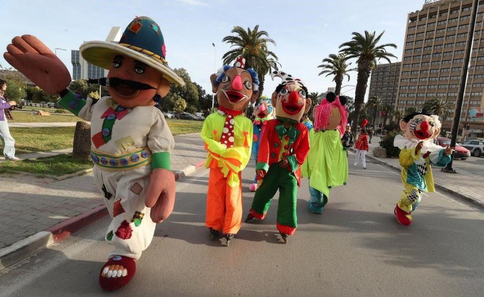 Puppeteers parade during the opening ceremony of the fourth edition of the Carthage International Puppetry Arts Festival (JAMC) in Tunis, Tunisia, 11 March 2023 .The fourth edition of the Carthage International Puppetry Arts Festival (JAMC) will be held from 11 to 18 March in Tunis and other cities across the country, where more than 100 puppeteers from all over the world will participate. The theme of this edition "Puppets, Art and Life"