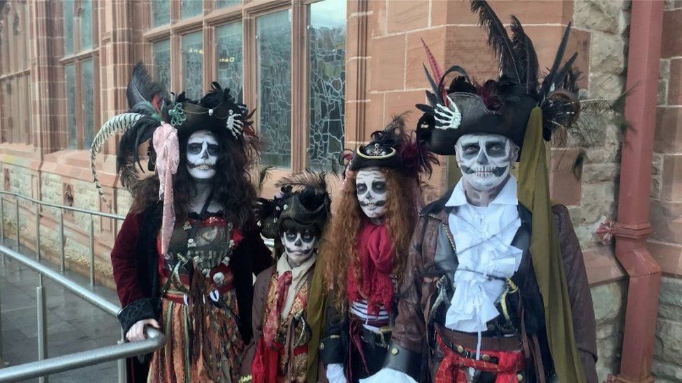 People attending the Halloween celebrations in Derry