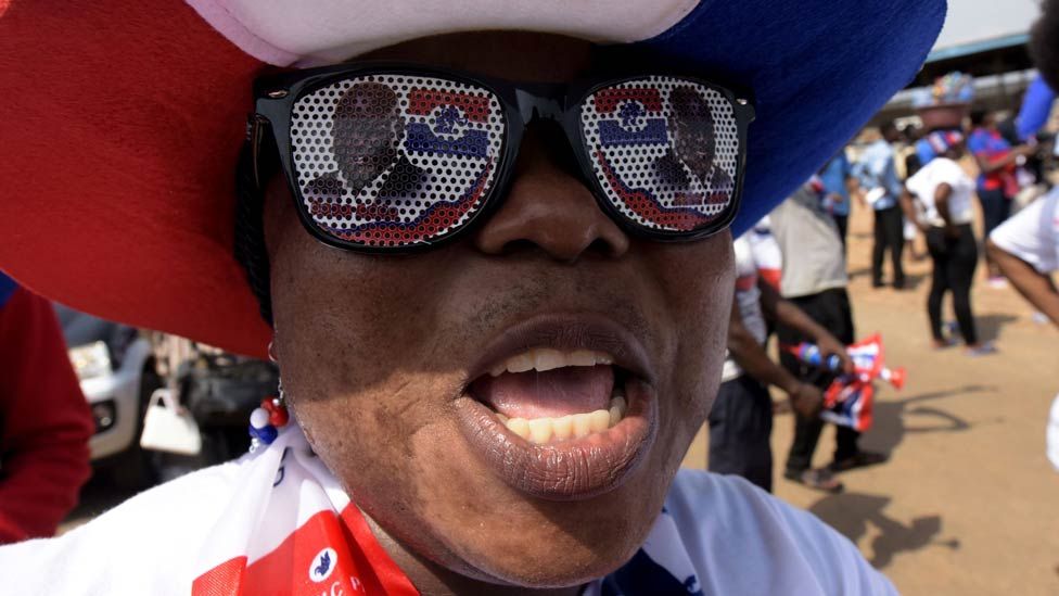 A supporter cheers during a campaign rally of presidential candidate of leading opposition New Patriotic Party (NPP) Nana Akufo-Addo in Accra, on 4 December, 2016
