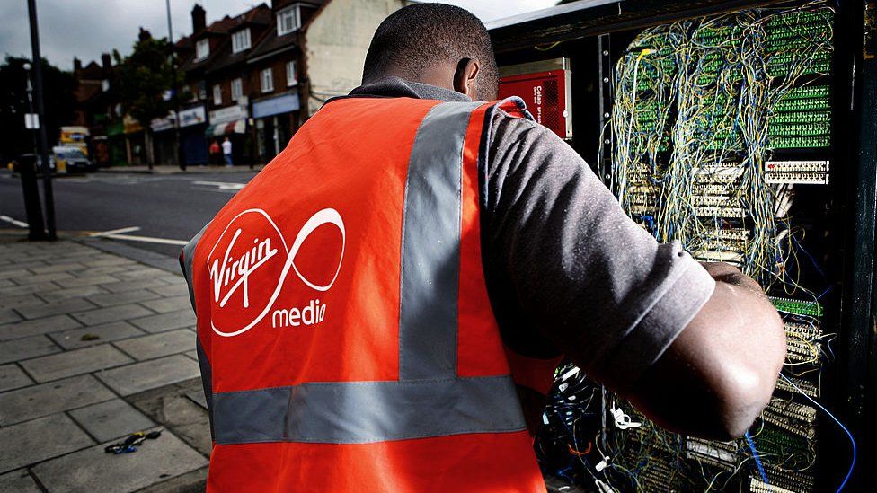 A Virgin Media engineer working