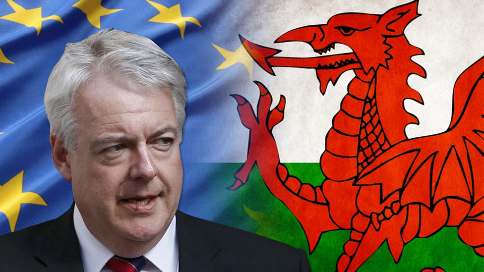 Carwyn Jones with Wales and EU flags