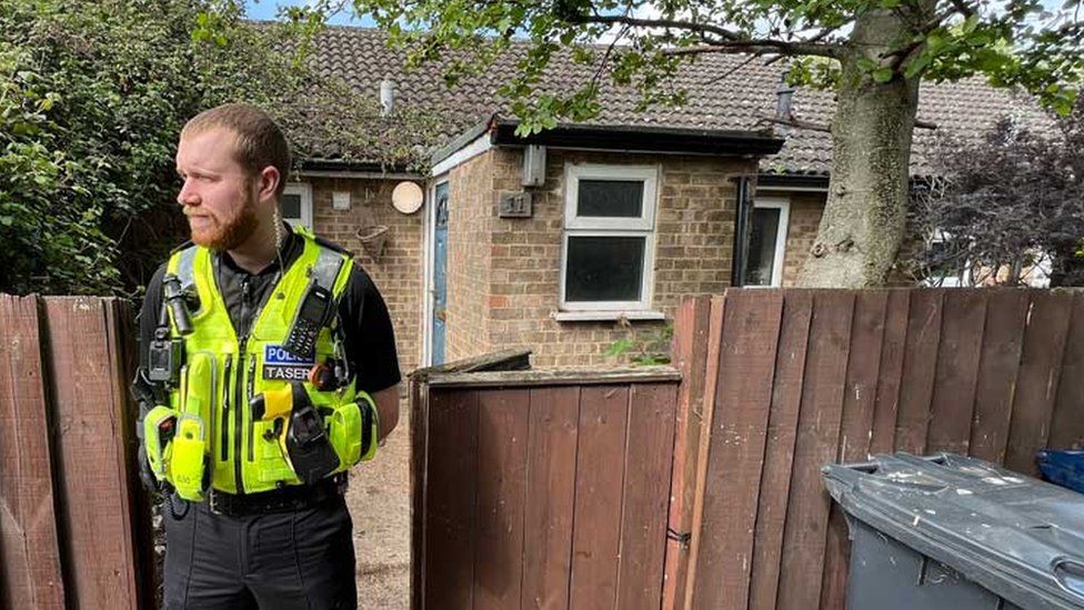 Police officer at Oswald Close, Ramsey