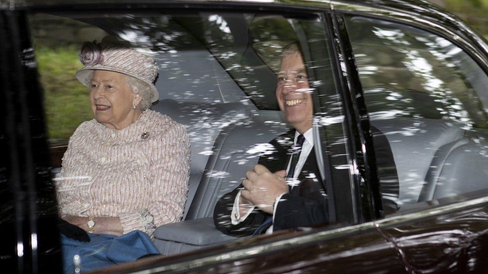 The Queen and Prince Andrew arrive in a car