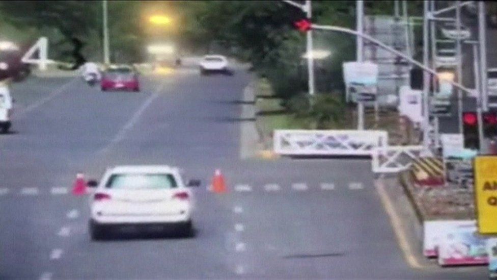 CCTV footage shows the white SUV jumping the light in Islamabad