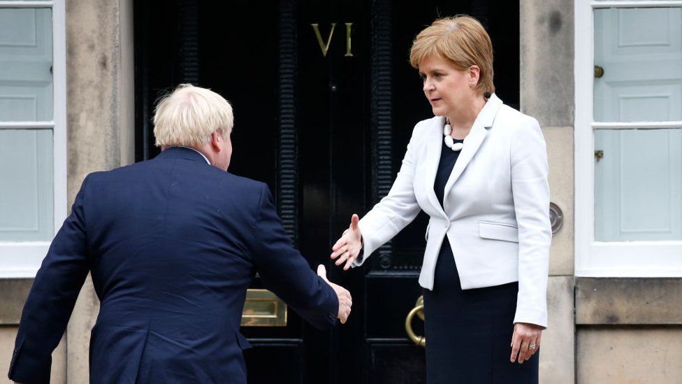 Boris Johnson about to shake hands with Nicola Sturgeon