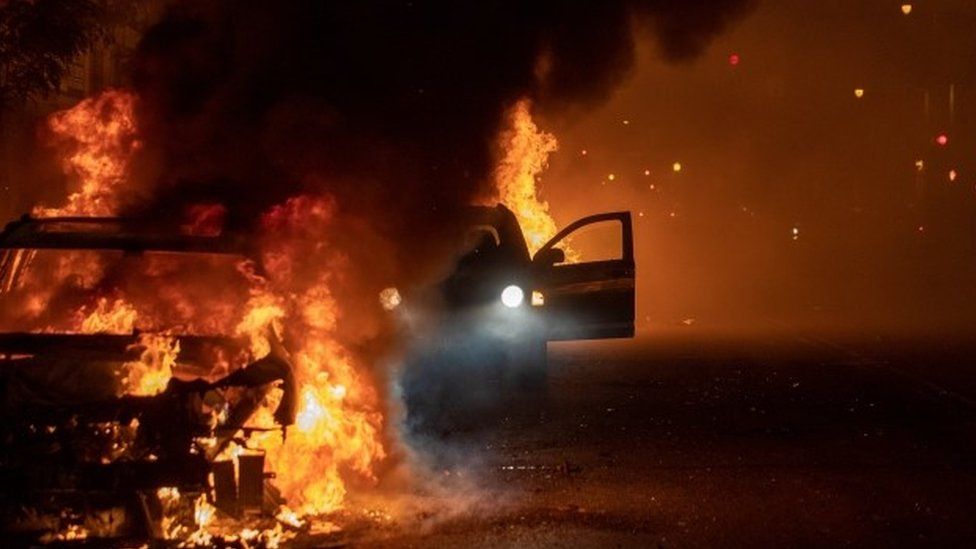 Cars burn in Minneapolis