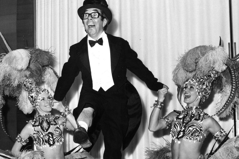 Corbett appeared many times on stage - here dancing with two cabaret dancers during a rehearsal for a two week season at the Savoy Hotel, London, in 1970