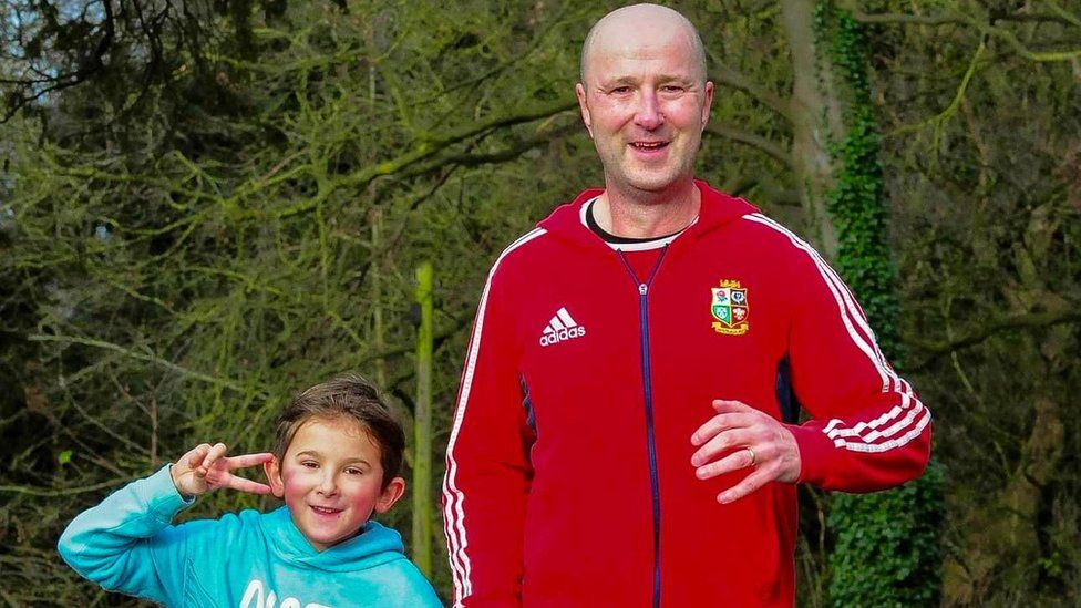 Ashley and his son at a Parkrun UK event