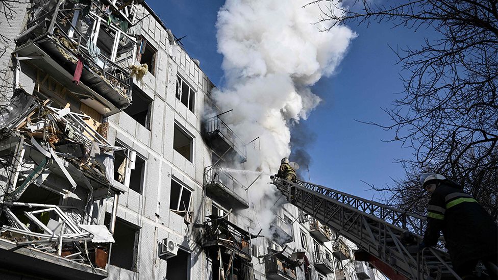 Firefighters working on a building in Chuguiv near Karkhiv