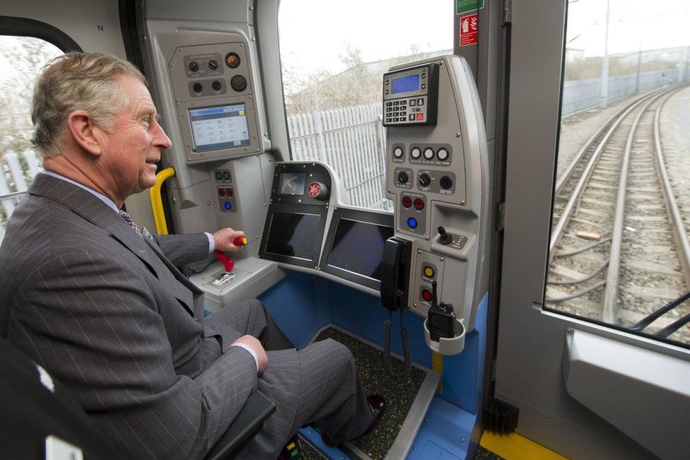 Prince Charles, Prince of Wales, is shown how to drive a London Underground tube train during a visit to Bombardier Transportation, where he toured the facilities and met employees working on London Underground tube trains, on February 24, 2012 in Derby, England
