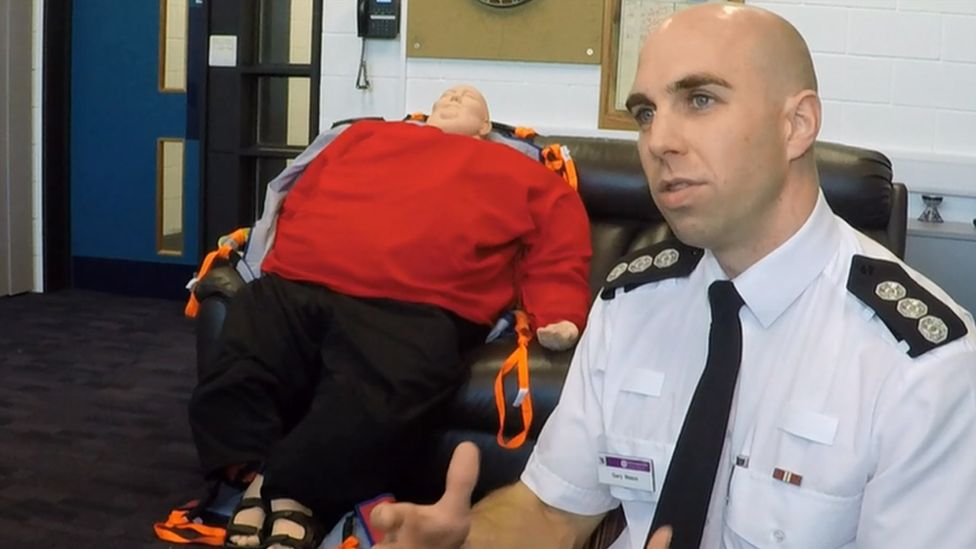 Station manager Gary Welch with mannequin