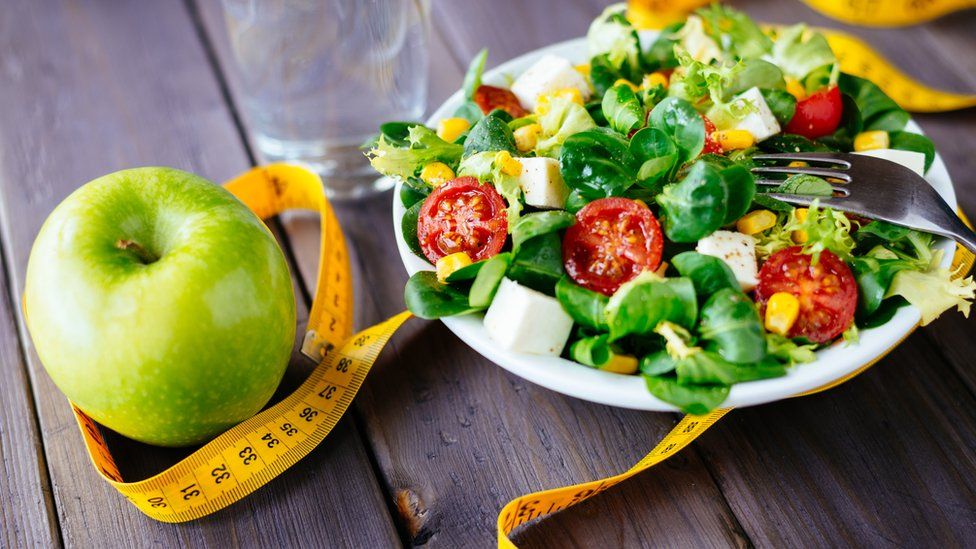 Healthy eating, apple and green salad