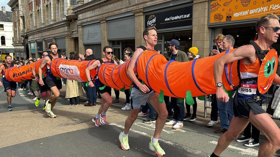 The team running in the costume on Sunday