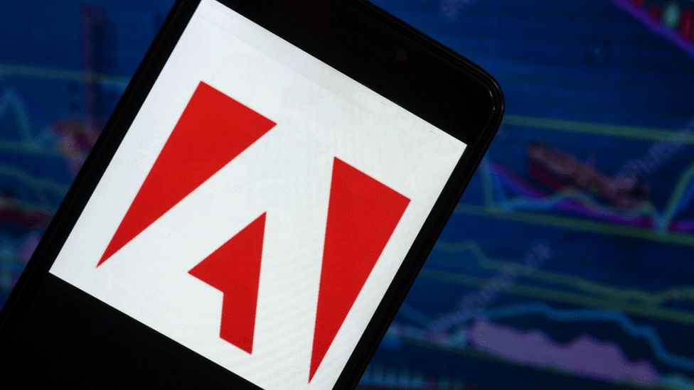 Adobe logo on a smartphone