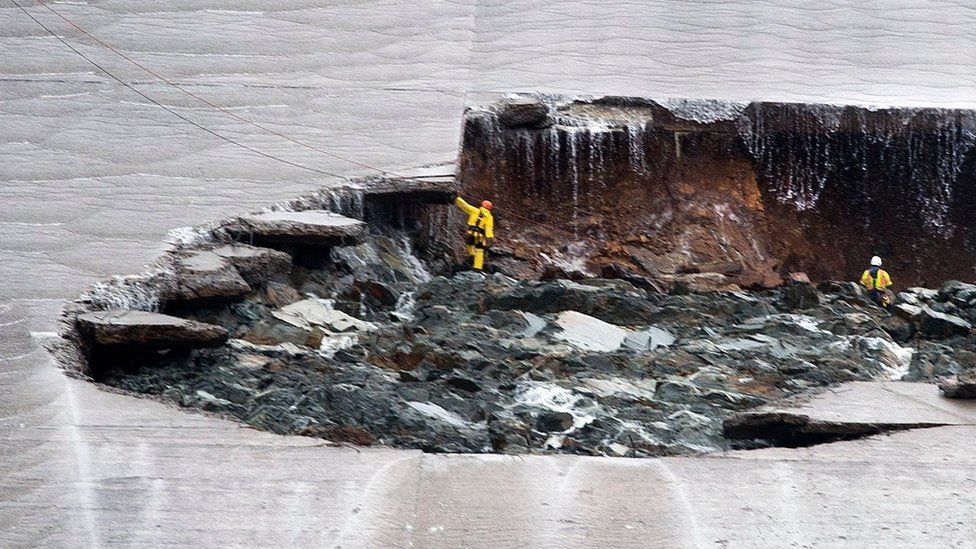 Workers inspecting part of the Lake Oroville spillway failure on Wednesday 8 February