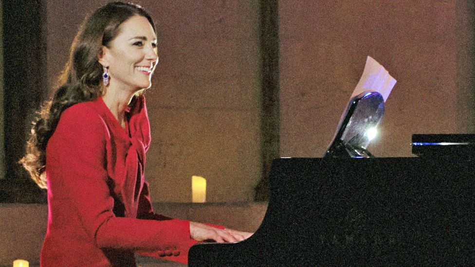 Duchess of Cambridge playing the piano at a community carol service at Westminster Abbey on 24 December 2021