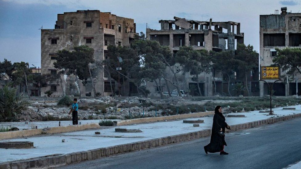 A destroyed street in the former IS capital of Raqqa